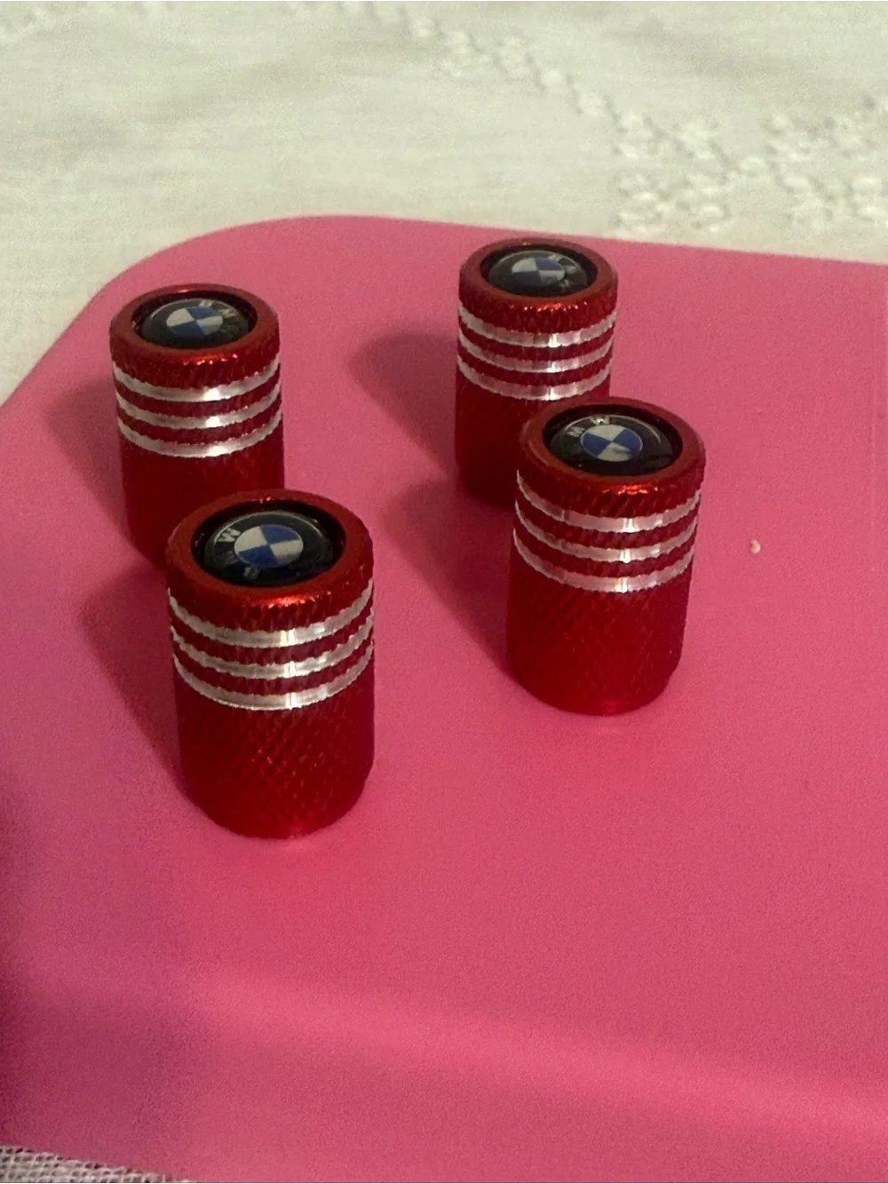 BMW Red Metallic Tire Valve Stem Caps with Logo (Set of 4)